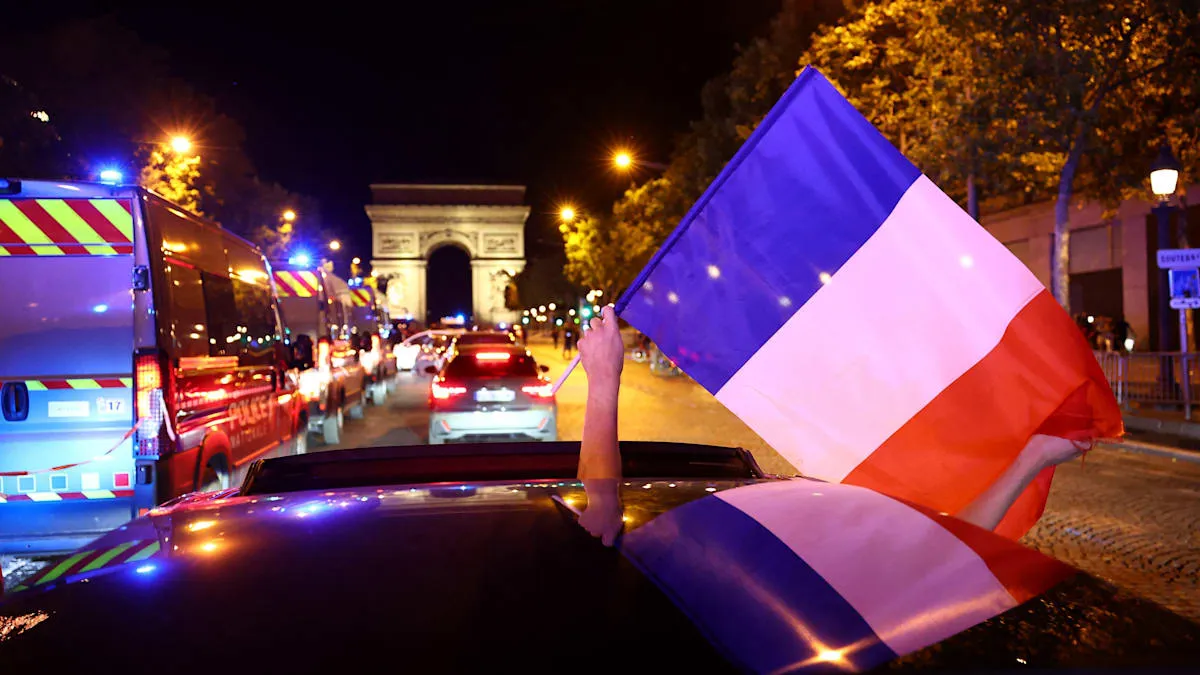 Paris Breathes Easy: France-Morocco Fans Celebrate Peacefully, Riot Fears Subside